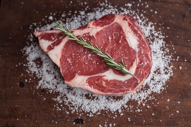 6.96 grams of protein in a steak