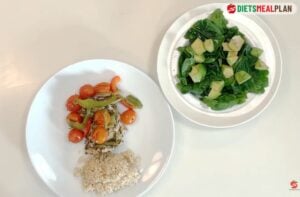 Baked Chicken and Vegetables Recipe (BRAT Diet Dinner-Transfer your baked chicken and vegetables onto a serving plate. Add cooked brown rice to the serving plate and sprinkle with sesame seeds