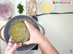 Ecuadorian Encebollado-Pour the blended vegetables and yuca