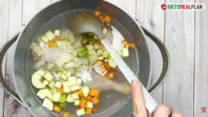 Low Fat Chicken Soup Recipe for Diverticulitis-Chop the carrots, zucchini, and potatoes into cubes and add them to the chicken broth