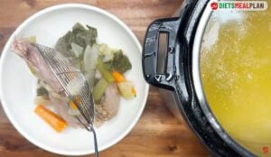 Bone Broth Recipe - remove all the solids and strain the broth