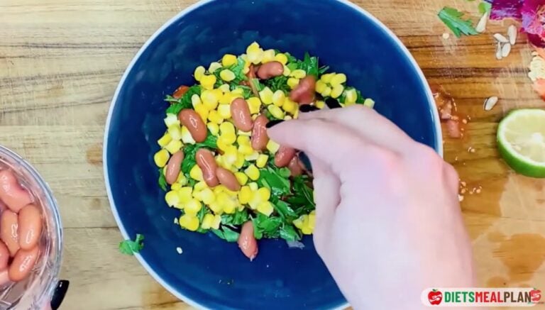 Vegan Mexican Burrito Recipe - Add the cooked corn, diced vegetables, and beans to a deep bowl