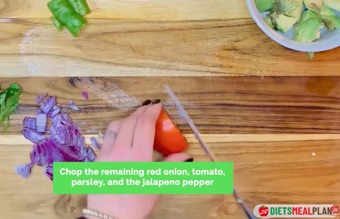 Vegan Mexican Burrito Recipe - Chop the remaining red onion, parsley, and one jalapeño for the guacamole