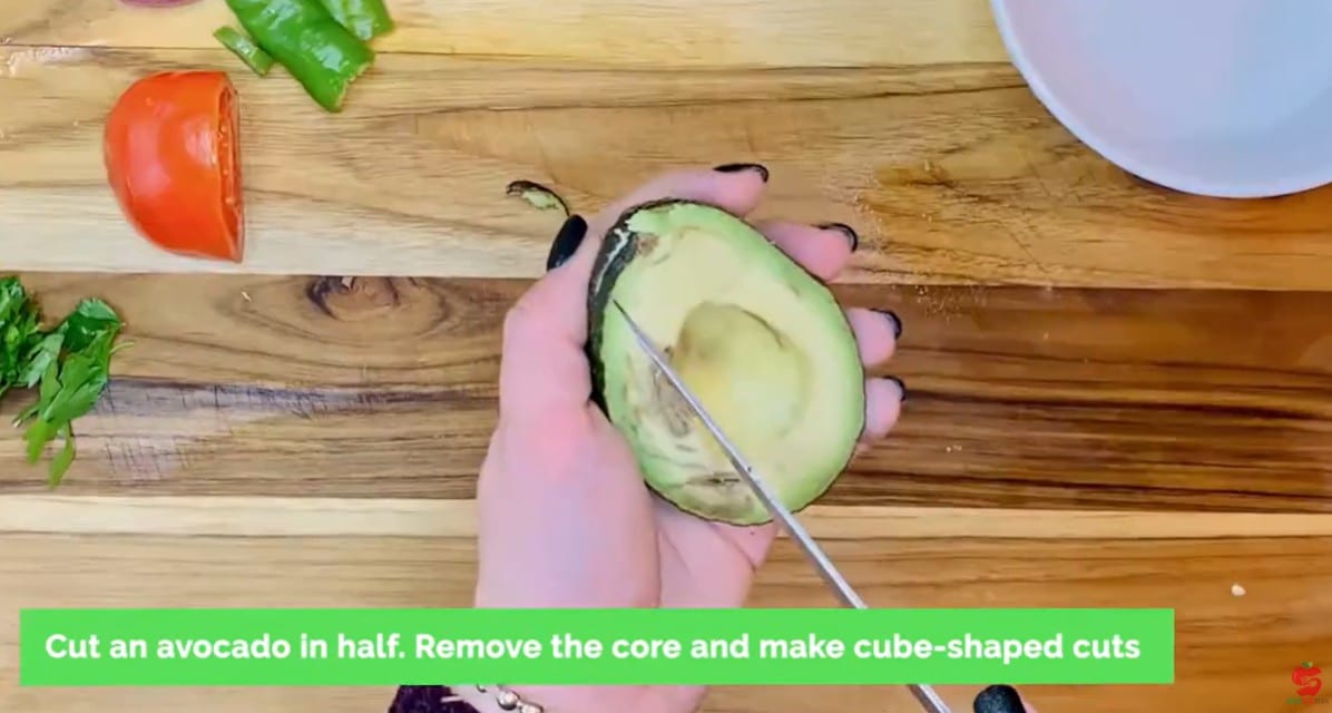 Vegan Mexican Burrito Recipe - Cut an avocado in half and remove the pit