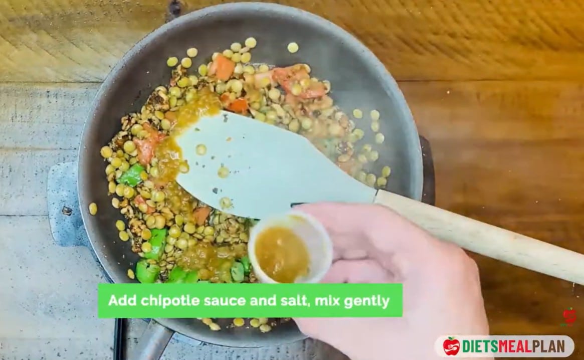 Vegan Mexican Burrito Recipe - Pour in the chipotle sauce, season with salt, and mix gently
