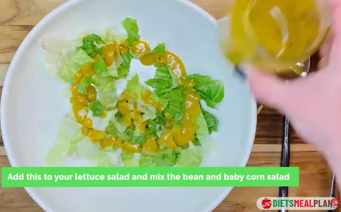 Vegan Mexican Burrito Recipe - Pour the dressing over the sliced lettuce and toss gently