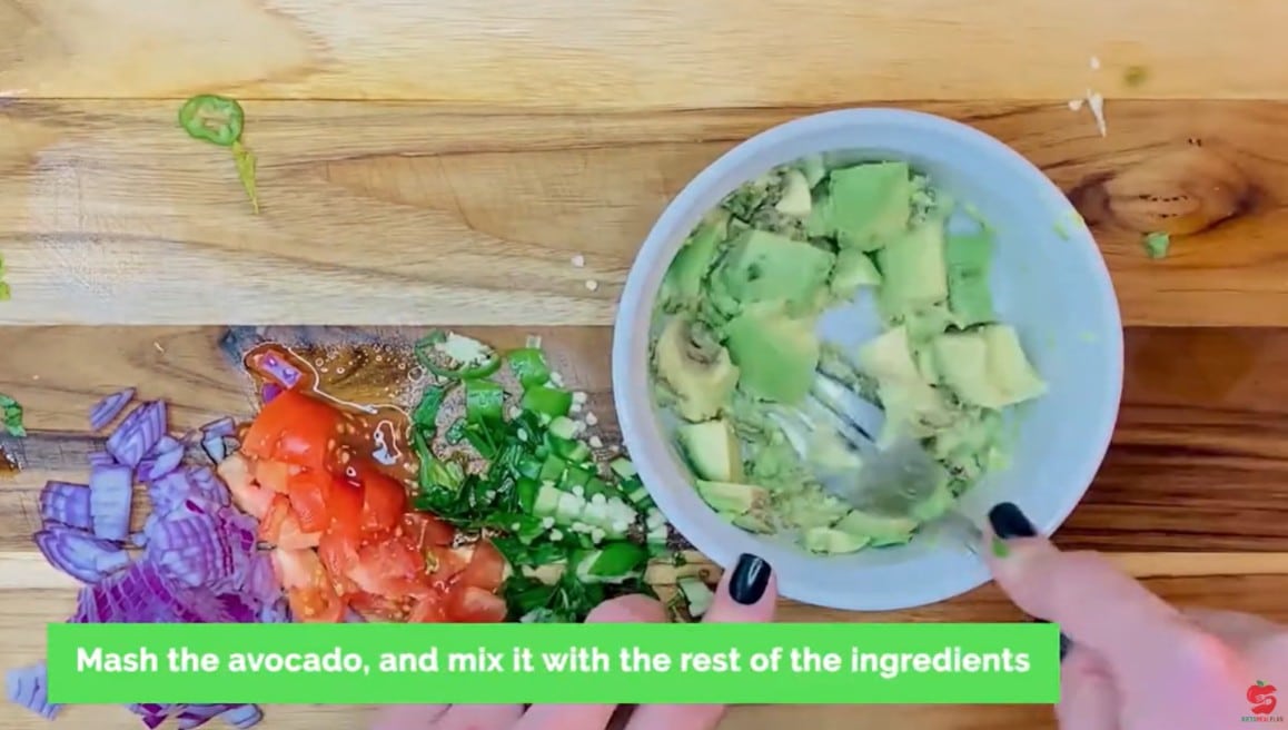 Vegan Mexican Burrito Recipe - Score the flesh in a crosshatch pattern and scoop it into a fresh bowl with a spoon