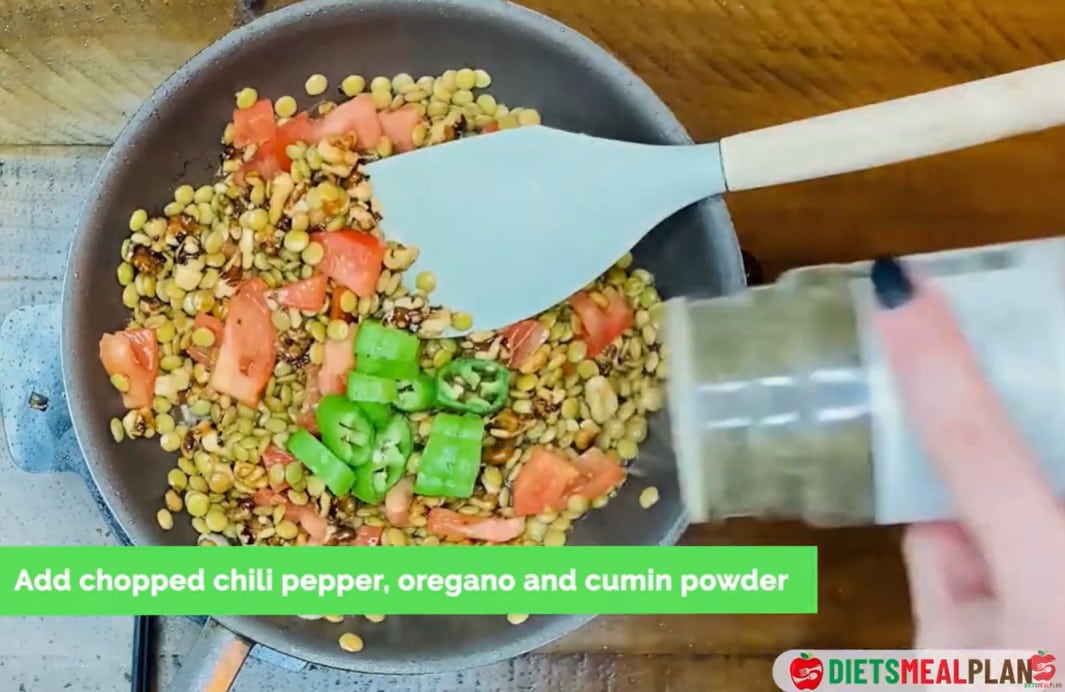 Vegan Mexican Burrito Recipe - Season with oregano and cumin, then sauté for another minute