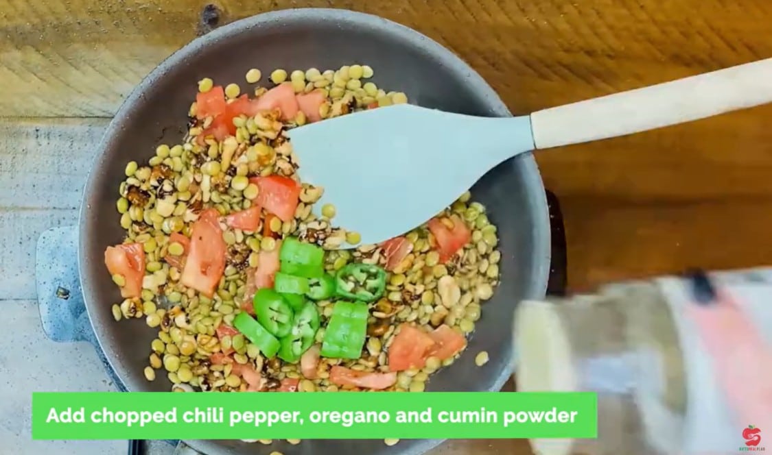 Vegan Mexican Burrito Recipe - Stir in the cooked lentils, chopped tomatoes, and chili pepper